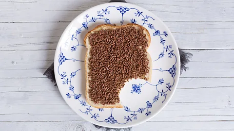 Getty Images Bread with butter and chocolate hagelslag with one bite taken out (Credit: Getty Images)