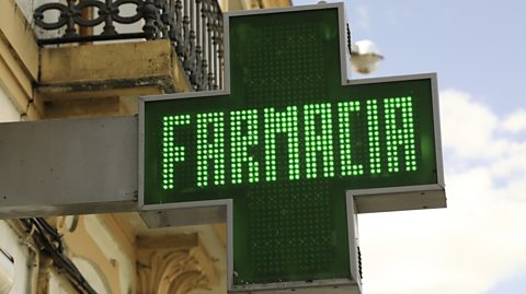 Spanish pharmacy illuminated sign