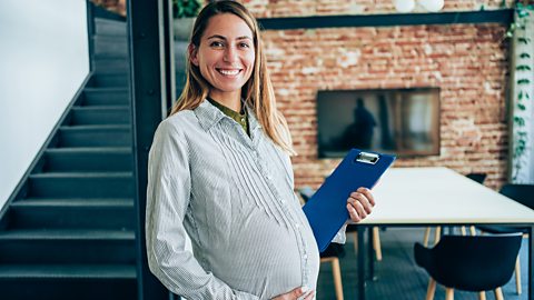 Pregnant office worker