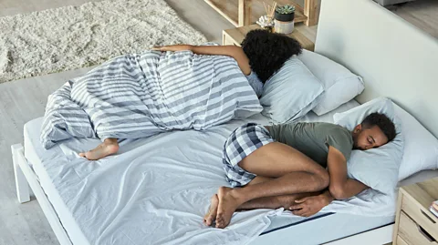 Getty Images Couples often find themselves in an endless battle of the thermostat (Credit: Getty Images)