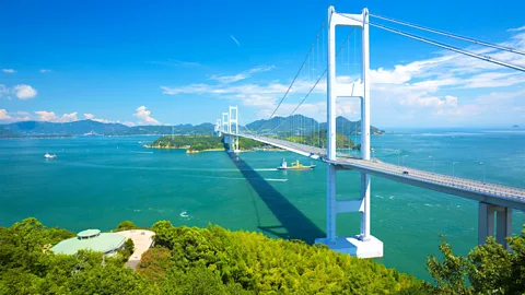 Alamy Suspension bridge on Japan's Shimanami Kaido cycling route (Credit: Alamy)