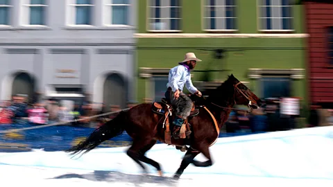 Getty Images The annual Leadville Ski Joring event entails a horse towing a skier at high speeds over jumps and obstacles in a timed competition (Credit: Getty Images)