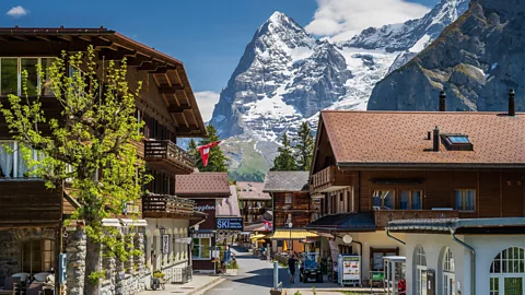 Alamy Mürren's car-free streets are lined with cosy inns, restaurants and ski rental outfitters (Credit: Alamy)