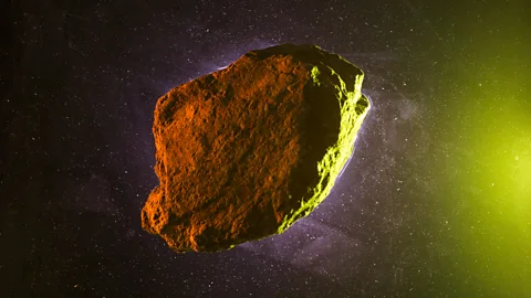 Getty Images An asteroid rock on a starry background (Credit: Getty Images)