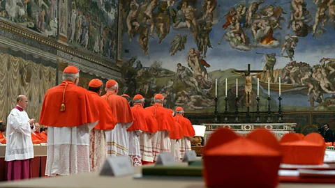 Alamy Cardinals vote for a new pope inside the Vatican's Sistine Chapel (Credit: Alamy)