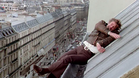 Alamy Peur sur la ville features vertigo-inducing scenes of Belmondo sprinting across – and sliding down – rooftops (Credit: Alamy)