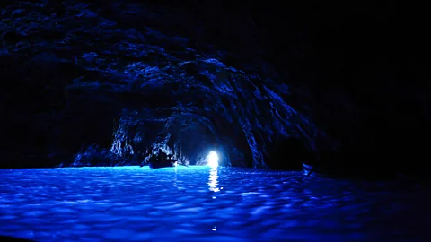 Alamy While stunning, the Blue Grotto suffers from overtourism, so insiders enjoy Anacapri's magical seas at nearby Gradola (Credit: Alamy)