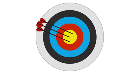 An archery target with three arrows in the yellow centre