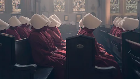 Disney/ Steve Wilkie Margaret Atwood’s The Handmaid’s Tale depicts a theocracy where executions are frequent (Credit: Disney/ Steve Wilkie)