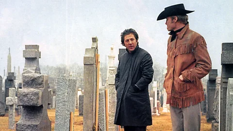 Alamy Dustin Hoffman and Jon Voight in a graveyard in a scene from Midnight Cowboy (Credit: Getty Images)