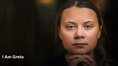 A close-up of climate activist Greta Thunberg taken from a still from the documentary I Am Great on BBC iPlayer