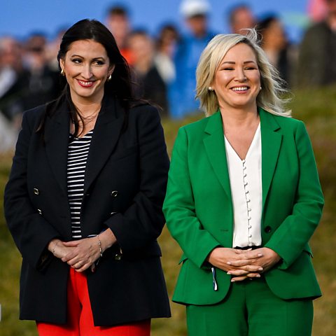 NI deputy First Minister Emma Little-Pengelly MLA, and NI First Minister Michelle O'Neill MLA smiling at the Amgen Irish Open Golf Championship 2024
