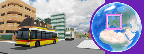 Bus driving past apartment blocks