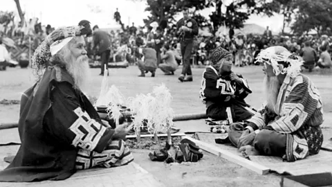 Alamy An Ainu religious ceremony in 1955. Researchers hope that teaching AI tools to speak Ainu can help preserve the language (Credit: Alamy)