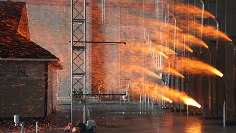 IBHS Generators throw embers – the leading cause of home ignitions – onto a full-scale structure in a 2011 test at the IBHS research centre in Richburg, South Carolina (Credit: IBHS)