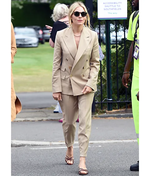 Getty Images Pale-hued, loosely structured tailoring, as worn by Sienna Miller, is a Wimbledon sartorial classic (Credit: Getty Images)