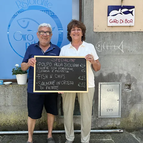 Mike MacEacheran Riccardo Orsucci and his wife Adele Pierotti run local fish restaurant Giro Di Boa (Credit: Mike MacEacheran)