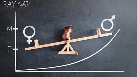 Chalkboard graph with an upward line graph illustrating unequal pay bias towards men with stack of coins resting on top of a seesaw.