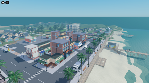 Image of the beach front of a seaside town.