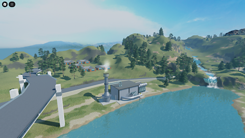 An scene showing a water facility by a river.