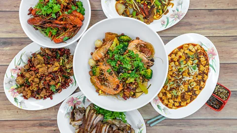 Alamy A top-down view of a table of authentic China Sichuan Hunan food (Credit: Alamy)