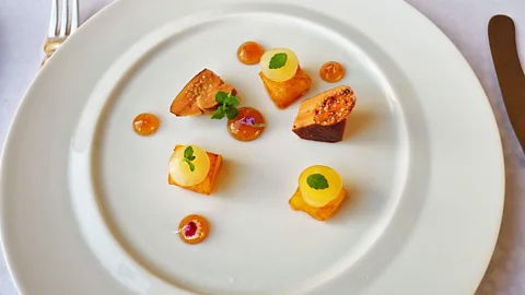 Alamy Michelin-starred restaurants are known for their starched white tablecloths and small portions (Credit: Alamy)