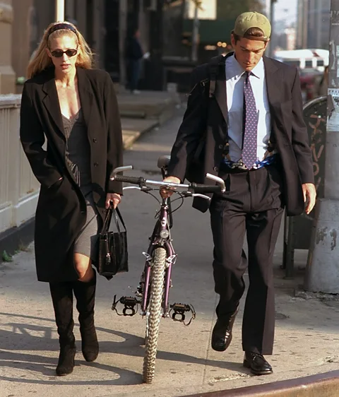 Getty Images Fashion items worn by such style icons as the late Carolyn Bessette-Kennedy – pictured with John F Kennedy Jr in 1996 – are highly sought after (Credit: Getty Images)