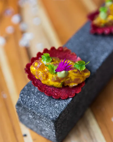 San Lucas A vibrant bite topped with edible flowers showcases the artistry of the San Lucas Treetop Dining Experience (Credit: San Lucas)