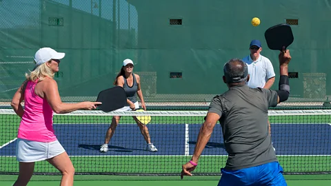 Getty Images The fast-growing sport of pickleball combines elements of tennis, badminton and ping pong (Credit: Getty Images)