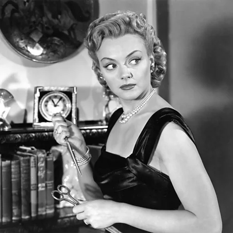 Alamy In the 1948 film Blonde Ice, Leslie Brooks starred as a cold-hearted adulterer, fraudster and murderer (Credit: Alamy)