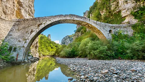 Alamy Noutsos Bridge, a single-arch stone bridge in Epirus, Greece (Credit: Alamy)