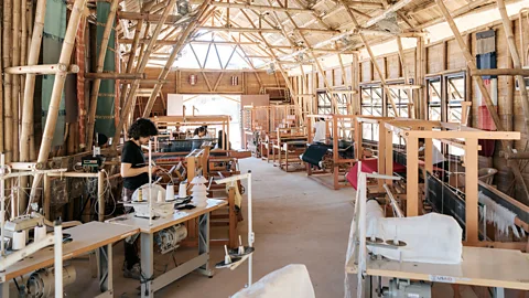 Base Bahay A weaving centre constructed from bent bamboo poles – giving the structure its curves – in Batangas in the Philippines, where locals make artisanal products (Credit: Base Bahay)