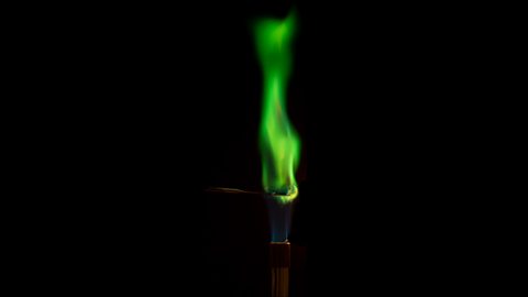 The flame of a Bunsen burner turns green during a test for metal ions
