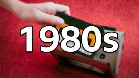 A blurred image of a cassette going into a tape player on a Christmassy background, with '1980s' superimposed over the top