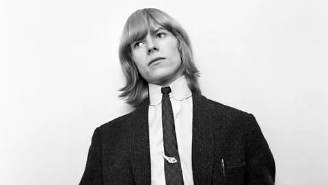Alamy David Bowie in a suit and tie in 1965 (Credit: Alamy)