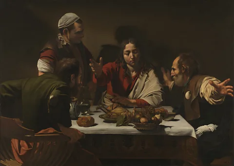 The National Gallery, London A comparison can be made between An Experiment on A Bird in The Air Pump and Caravaggio's Supper at Emmaus (1601) (Credit: The National Gallery, London)