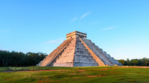 El Castillo - a step pyramid featuring 91 steps on each site - in the sunshine in Chichén Itzá, in the Mexican state of Yucatán 