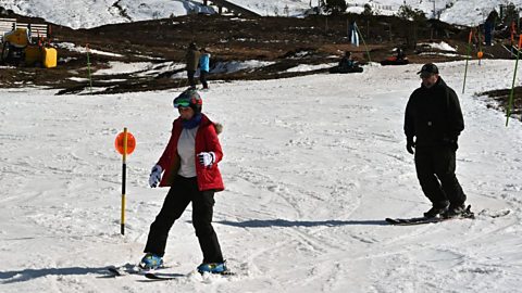 An image showing people skiing in the Cairngorms in March 2024