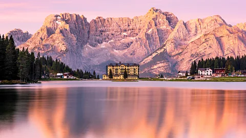 Alamy Dolomites Mountains Peaks at Sunrise over Lake Misurina in Italy (Credit: Alamy)