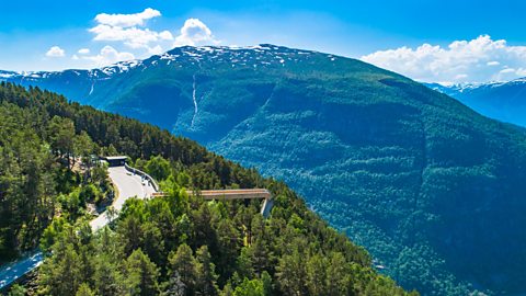 Stegastein viewpoint toilet in Aurland, Norway with panoramic fjord views and modern architecture on scenic mountain road.