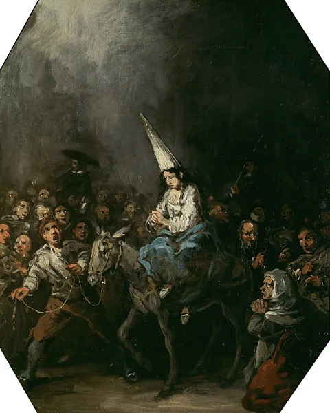 Getty Images Tall pointy hats – otherwise known as capirotes or corozas – were used in history as a tool of persecution (Credit: Getty Images)