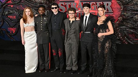 An image showing members of the Stranger Things cast at the premiere of the fifth and final season
