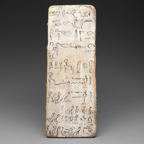 A photo of a writing board by an apprentice scribe from 2030BC.
