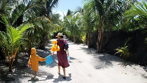Getty Images There are barely any cars on Thoddoo, just electric buggies, scooters and bicycles, which adds to the island’s peaceful, unhurried feel (Credit: Getty Images)