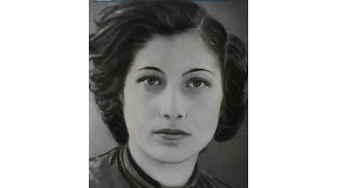 Black and white photo of Noor Inayat Khan, a woman in her early 20s of Indian and American heritage, wearing her dark bobbed hair in a style popular in the 1940s