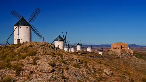 Getty Images Don Quixote windmills on a rocky landscape in Consuegra, Toledo (Credit: Getty Images)
