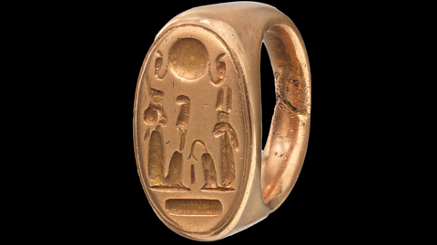 A photograph of a finger ring, likely belonging to Queen Tiye, from 1390–1336BC. image provided but the Met Collection.