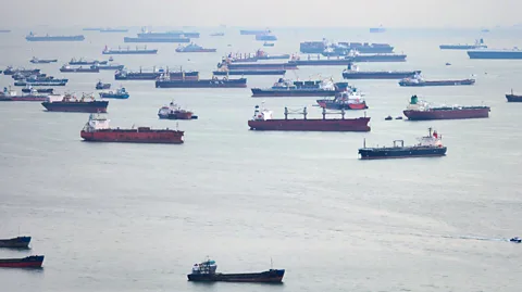 Getty Images Around 90% of consumer goods are carried across the world on huge container ships (Credit: Getty Images)