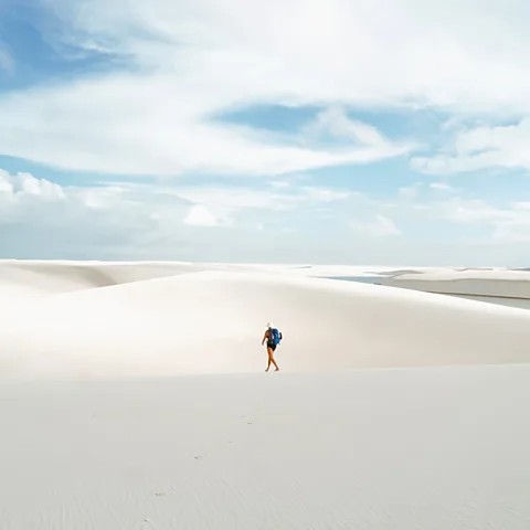 Carla Vianna The park's shifting landscape spans 1,500 sq km, with dunes rising up to 30m (98ft) high (Credit: Carla Vianna)