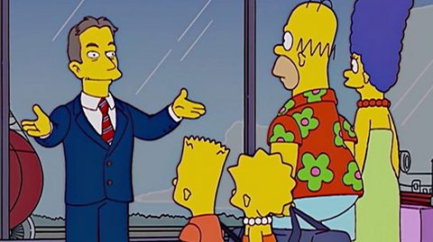 Tony Blair and The Simpsons family.